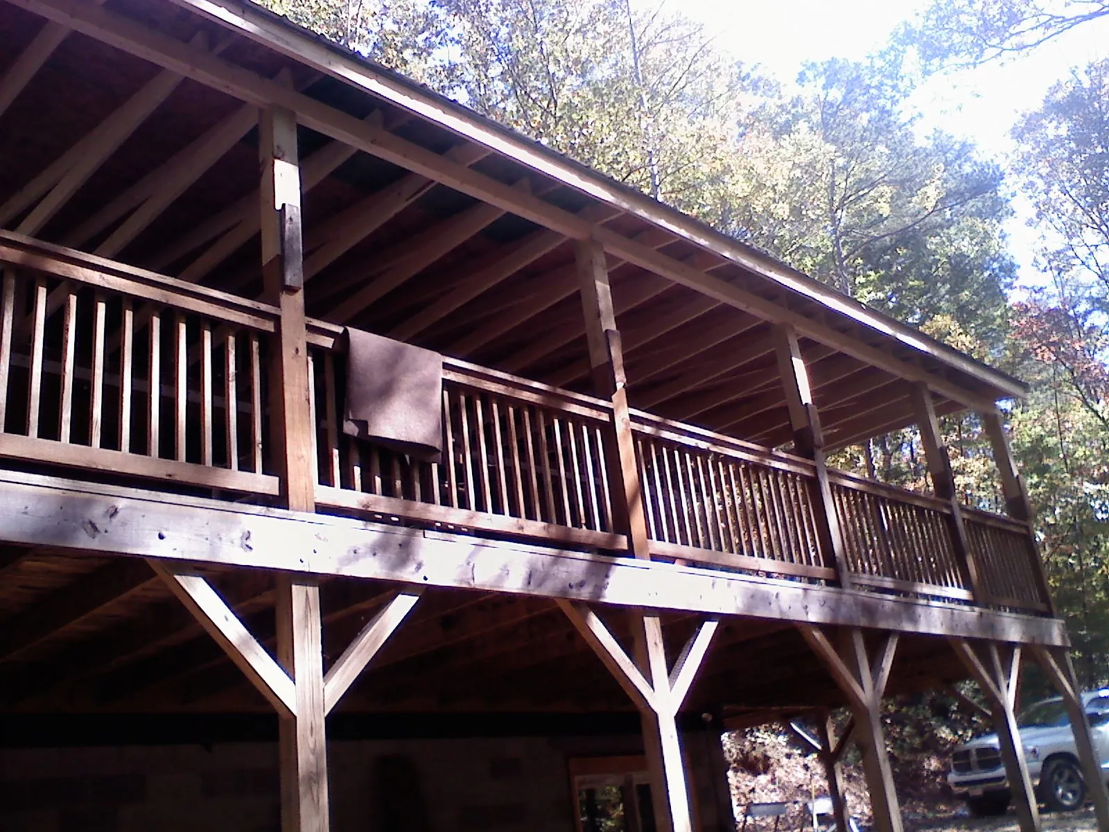 Timber framing under a new elevated porch and deck — Roof Leak Repair in Corolla by Roofing Brothers